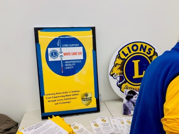 A table with brochures from the Lions Club International 